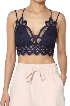 PRICES MAY VARY. Women's Padded Lace Bralette: Chic crochet design with scalloped edges, perfect for modern, bohemian styles. Cross Straps & Stretchy Smocked Back Crop Top: Offers adjustable comfort and a perfect fit, ideal for festival wear or casual outings. Versatile & Breathable Bra Top: Easily pairs with jeans or skirts, making it suitable for summer festivals, beach days, or casual weekends. Floral Crochet Detailing Cami: Adds a touch of romance and femininity, enhancing any wardrobe with Bra Crop Top, Chic Crochet, Crochet Bra, Strappy Bralette, Padded Bralette, Floral Crochet, Crop Top Bra, Lace Design, Cross Straps