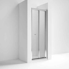 an empty white room with a glass door and no people in it on the floor