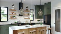 a kitchen with green cabinets and marble counter tops, hanging lights over the island area