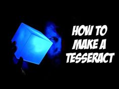 a man holding up a blue light in his hand with the words how to make a tessenact on it