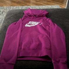 Good Condition Never Worn Purple Sportswear Hoodie For Fall, Nike White Hoodie For Fall, Sporty White Outerwear With Kangaroo Pocket, Nike Fleece Hoodie For Spring, Trendy Nike Winter Sweatshirt, Nike Spring Hoodie Sweatshirt, Nike Spring Hoodie, Nike White Hoodie With Adjustable Hood, Nike Spring Hoodie Outerwear