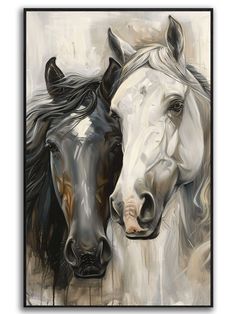 two black and white horses standing next to each other in front of a gray background