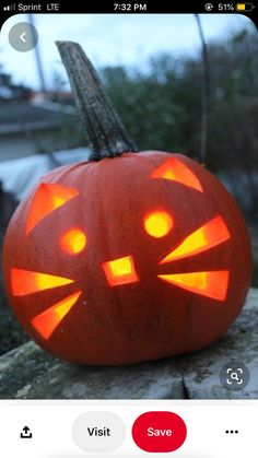 a pumpkin with an image of a cat's face carved into it