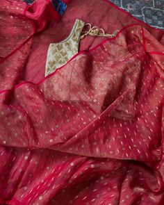 Valentine’s Day is the perfect occasion to don this breathtaking red Muslin/Matka sequin saree.   A genuine designer masterpiece, its body front is crafted from pure muslin by tissue silk handwoven, showcasing a gorgeous golden shimmer. Delicate Zari motifs and metal flowers are intricately woven and securely attached within the fabric. Shop here ➡️ https://panachecreation.com/products/designer-pure-matka-muslin-silk-red-antique-gold  #panachethedesicreations #matkasilk #desigbersaree #usasar... Sequin Saree, Securely Attached, Metal Flowers, Fabric Shop, Bts Pictures, Morning Quotes, Good Morning Quotes, Antique Gold, Stylish Design