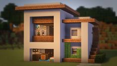 an image of a modern house in the minecraft style with lots of windows and doors