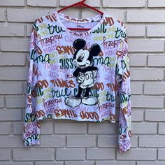 Disney “Mickey Mouse” Long Sleeved Multicolored T-Shirt. Size Large. Ribbed Detail At Neckline And Cuffs. Please See Pictures For All Measurements. Brand New Condition. Disney White Top With Letter Print, Cute Minnie Mouse Long Sleeve T-shirt, Playful Minnie Mouse Crew Neck Top, Cute Long Sleeve Minnie Mouse T-shirt, Disney Long Sleeve Top With Graphic Print, Disney Cotton Tops For Streetwear, Crew Neck Cotton Top With Minnie Mouse Design, Mickey Mouse Long Sleeve T-shirt For Streetwear, Mickey Mouse Crew Neck Top For Streetwear