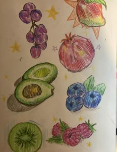 a drawing of different fruits and vegetables on a piece of paper with colored crayons