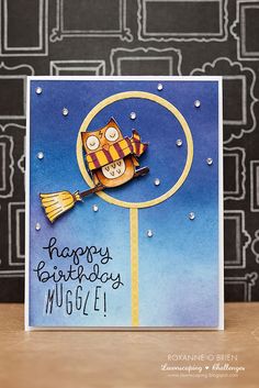 a birthday card with an owl holding a broom