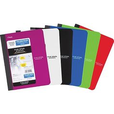 five different colored notebooks are lined up