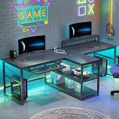 a gaming room with three computer desks and neon lights