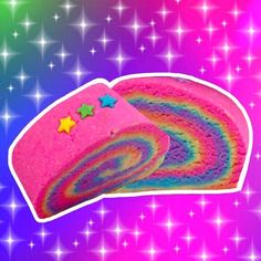 there is a rainbow cake with stars on it