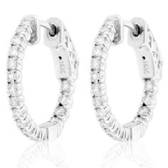 White sparkling diamonds line the inside and outside of these hoop earrings. This jewelry is crafted of 14 karat white gold with a high polish finish. White Diamonds Diamonds: 34 Diamond cut: Round Diamond weight: 3/4 carat Color: G-H Clarity: SI1-SI2 Setting: Prong Metal information and dimensions Metal: 14k white gold Finish: High polish Style: Hoop Clasp: Saddleback Earring dimensions: 19 mm Kay Jewelry Zales, Gemstone Brooch, Cubic Zirconia Bracelet, Cubic Zirconia Jewelry, Jewelry Rings Diamond, Cubic Zirconia Earrings, Gemstone Necklace Pendant, Diamond Pendant Necklace, Gemstone Bracelets