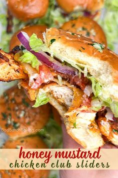 a chicken club sandwich with lettuce, tomato and onions in the foreground text reads honey mustard chicken club sliders