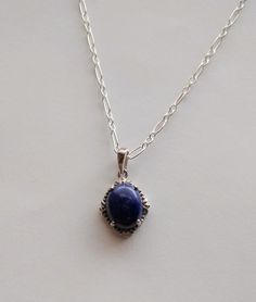 18min genuine lapis lazuli pendant, oval stone 8 x 10 mm set in bright stainless steel sterling bail and 1.7 mm flat cable link chain, spring ring clasp Medieval Things, Fantasy Things, Blue Stone Pendant, Tanzanite Bracelet, Lapis Jewelry, Rubellite Tourmaline, Lapis Lazuli Pendant, Lapis Lazuli Necklace, Magical Jewelry