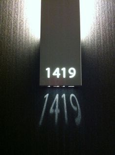 the door is open and there are numbers on it