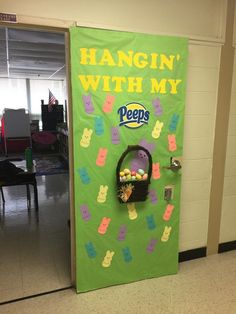 a door decorated with peeps and an easter basket