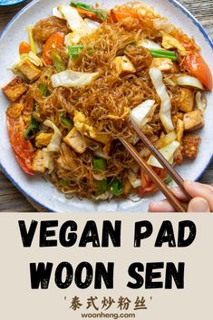 vegan pad woon sen with chopsticks in front of it on a plate