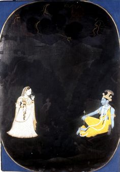 an old black and gold plate with two women sitting on the ground next to each other