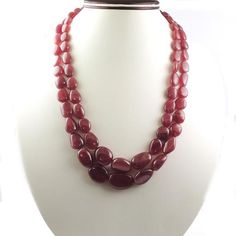 2 Lines Of Natural African Ruby Necklace - Smooth Oval Necklace - Gemstone Precious Necklace 21mmx14mm-11mmx9mm PN027Specifications:-Gemstone - African RubyShape - Oval (Smooth)Size-21mmx14mm-11mmx9mm Length - 22 InchesBeads-65+Carat-990Beautiful layered  precious long Necklace. The necklace can be adjusted according to the neck size.Amazing quality at the best price around!!! Bulk wholesale orders are welcome on this item and any others in my shop, convo me for pricing information. Formal Oval Necklace With Polished Beads, Oval Gemstone Beads Necklaces For Formal Occasions, Formal Oval Gemstone Beads Necklaces, Oval Necklace With Natural Stones For Formal Occasions, Formal Oval Gemstone Beads Necklace, Oval Bead Gemstone Necklace For Formal Events, Formal Gemstone Necklace With Oval Beads, Formal Oval Bead Gemstone Necklace, Faceted Oval Necklaces For Anniversary