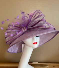 Elegant Adjustable Top Hat With Feather Trim, Elegant Purple Flat Brim Hat, Purple Feathered Hat For Kentucky Derby, Adjustable Purple Hat With Feathers, Wide Brim Feathered Fascinator, Purple Feathered Hats For Summer, Elegant Purple Feathered Headpiece, Adjustable Feather Hat For Church, Adjustable Feathered Hats For Church