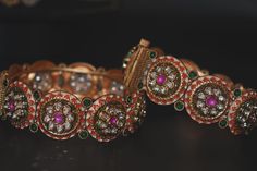 Embrace the timeless elegance of tradition with our intricately designed premium imitation jewelry bangles, adorned with dazzling stones and vibrant accents. Perfect for adding a royal touch to any outfit. 🌟✨ #mrjewels100 #PremiumImitationJewelry #TraditionalElegance #JewelryLovers #BangleBliss #costumejewelry #bangles #banglescollection Jewelry Bangles, Gold Bangle, Stone Gold, Bangles Jewelry, Gold Bangles, Costume Jewelry, Timeless Elegance, Gold Jewelry