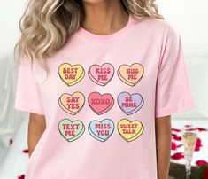 Looking for the perfect way to show your love for your special someone this Valentine's Day? Look no further than our trendy valentines day shirt! This comfortable and stylish shirt features colorful hearts graphic on the front, making it the perfect gift for anyone you love. Plus, because it's made from 100% cotton, it will keep you warm all winter long.  So whether you're shopping for yourself or giving the gift of comfort and style, our trendy valentines day shirt is sure to please. It is a U Heart Tshirts, Kids Candles, Candle Bags, Nurse Shirts, Boy Bye, Anti Valentines Day, Conversation Hearts, Candy Hearts, Heart Tee