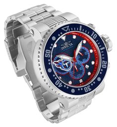 This beautiful Invicta NFL watch contains a Quartz movement, held by a stunning steel, dark blue, light blue case. Its face displays a navy blue, red, white, light blue metal dial protected by a highly resistant Mineral Crystal. This timepiece is completed by a silver stainless steel band and it offers water resistance of up to 200m.Since its inception in La Chaux-de-Fonds, Switzerland in 1837, a commitment to excellence and innovation has been at the heart of every collection created by Invicta Blue Stainless Steel Watch Accessory With Metal Dial, Blue Stainless Steel Chronograph Watch, Mens Invicta Watches, Best Watches For Men, Blue Cases, Invicta Watches, Tennessee Titans, Blue Steel, 200m