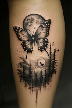 a woman's thigh with a butterfly on it and trees in the foreground