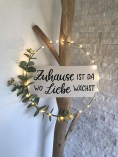 a sign that says,'zhlause ist da wo leibe wachst '