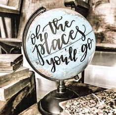 a globe sitting on top of a wooden table