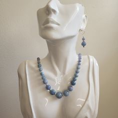 Hand-woven with 100%silk thread, these light blue angelite beads will lay beautifully against the neck. They feel so good as they are handmade with quality and care. I have made a matching pair of earrings. All beads are natural, have no dyes, and are high quality!  They will come in a jewelry box as shown above!  About 20 inches long. Message me with any questions. I'm always happy to help. Long Message, Necklace And Earrings Set, Intellectual Property, Necklace And Earrings, Silk Thread, Earrings Set, Natural Light, Hand Woven, Earring Set