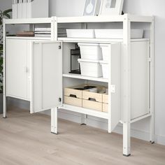 a white computer desk with drawers and shelves