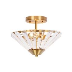 an image of a flush light fixture with crystal glass in the middle and gold trimmings