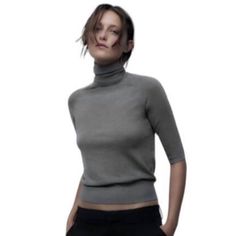 Featuring Turtleneck Style Collar And Half-Sleeve. Black Ribbed Top, Sleeveless Turtleneck Sweaters, White Turtleneck Sweater, Chunky Cable Knit Sweater, Turtleneck Style, Striped Vests, Cropped Knit Sweater, Ruffle Sweater, Grey Turtleneck