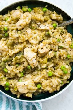 chicken risotto with peas and peas in a skillet