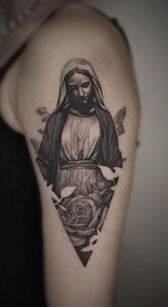 a woman with a rose tattoo on her arm