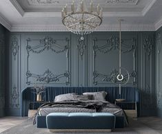 an elegant bedroom with blue walls and chandelier above the bed, along with a large rug on the floor