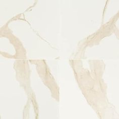 four different images of white marble with brown streaks