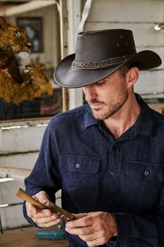 Buffalo hide hat | leather hat | mens outback hat Leather Wide Brim Fedora For Outdoor, Leather Fedora With Curved Brim For Outdoor, Rugged Leather Wide Brim Fedora, Rugged Leather Wide-brim Fedora, Rugged Leather Hat Bands, Country Style Leather Fedora For Outdoor, Rugged Leather Hat Bands For Ranch, Rustic Leather Hat Bands For Outdoor, Rugged Leather Hats For Ranch