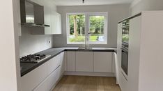 the kitchen is clean and ready for us to use in its new owner's home