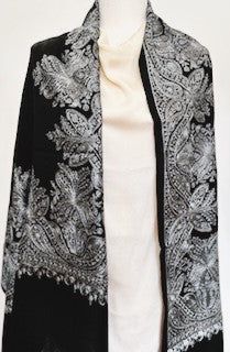 Our Embroidered Shawl features fine embroidery on soft 100% merino wool. Specialty piece. This classically beautiful shawl showcases the intricate embroidery traditions of Northern India with stunning embroidery in metallic tones on a black base. Suitable for a black tie event, evening out, dinner party. Can change the look of last year's dress or pantsuit. A formal living room, drape over the back of the couch. The high quality and elegance of our embroidered shawls make them treasures that wil Black Pashmina Shawl With Embroidered Border, Elegant Black Pashmina Shawl For Formal Occasions, Elegant Black Festive Shawl, Elegant Black Pashmina Shawl With Embroidered Border, Traditional Black Shawl For Formal Occasions, Black Pashmina Shawl For Formal Occasions, Black Formal Pashmina Shawl, Elegant Black Pashmina Shawl For Festive Occasions, Formal Black Pashmina Shawl