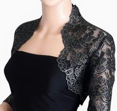 Excellent quality soft, thick, heavy corded lace Bolero in either black and gold or black and silver with 3/4 sleeves Would enhance any evening dress for that special occasion Luxury Elegant Semi-formal Jacket Dress, Luxury Semi-formal Elegant Jacket Dress, Luxury Black Semi-formal Outerwear, Luxury Long Sleeve Jacket Dress For Evening, Luxury Formal Outerwear With Lace Trim, Woman’s Lace Dresses And Jackets, Luxury Black Dress With Lace Collar, Luxury Black Lace Top For Formal Occasions, Bolero For Evening Dress