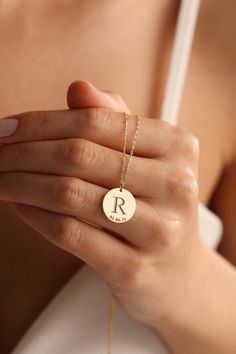 "Here is the super elegant initial necklace. You may design your necklace with any letter and dates as you want. This letter necklace is fully customizable and proper for any combine. This gold letter necklace is one of our favorite design and great gift idea for women. Gold Name Necklace is the most beautiful gift in the world. The easiest way to make a woman happy may be to order her a timeless letter necklace.  This personalized necklace would make a wonderful personalized Christmas gift, birthday gift, anniversary gift. The gold name necklace is a durable solid necklace. First quality materials are used while producing our letter necklaces.  Our chains are produced by hand with a special system. It has a solid form. All our jewelry is %100 custom made by hand with Love and Care in our Name Jewelry Personalized, Letter Necklace Gold, Solid Necklace, Initial Letter Necklace, Woman Happy, Alphabet Necklace, Gold Gift Boxes, Letter Jewelry, Gold Letter Necklace