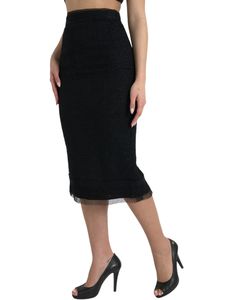 A back zipper ensures a seamless fit while the iconic logo detail adds a touch of designer appeal. Color: Black High Waist Material: 36% Virgin Wool, 35% Nylon, 14% Cotton, 12% Mohair, 2% Elastane, 1% Polyester Country of origin: IT Gonna Midi, High Waist Midi Skirt, Skirts Midi High Waisted, Wedge Pumps, Iconic Logo, Black High Waist, Plush Fabric, Dolce E Gabbana, Premium Brands