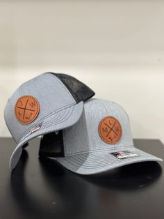 | Custom Father/Son Matching initial & Clip art Leather Patch Hat | The perfect hat for Dads & Sons. These are Richardson 112 hats, you are purchasing one YOUTH size hat & one ADULT hat. Both Hats are the same color that you select in the color options. The youth hats fits most kids age 3yr - 12yr with adjustable snapback! Adult hats are adjustable and fit most adults and kids 12yrs + My hats are made to outlast all that you may put them through. The durable laser engraved patch is glued and the Trucker Fitted Hat With Leather Patch And Curved Brim, Adjustable Trucker Hat With Leather Backing And Curved Brim, Father Son Hats, Trucker Hat With Curved Brim And Leather Patch, Father's Day Flat Bill Hat With Leather Patch, Leather Patch Cap - Gift, Father's Day Snapback Hat With Leather Patch, Adjustable Leather-backed Trucker Hat With Curved Brim, Initial Clip