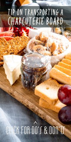 an assortment of cheeses, crackers and fruit on a cutting board with text overlay reading tips on transporting a charcuterie board