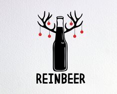 a bottle with reindeer antlers on it sitting next to the word rehnber