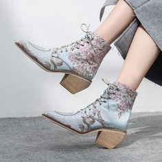 This is a special and unique boot, right? It certainly adds score to your whole styling. Featuring gorgeous floral embroidery and a classy wooden heel, it's certainly a pair of boots that will turn some heads. Specs: Material: Microfiber, Rubber Floral Embroidered Heels, Embroidered Heels, Unique Boots, Short Ankle Boots, Embroidered Boots, High Heel Boots Ankle, Retro Women, Luxury Silk, Wooden Heel