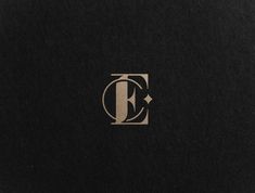 the letter e is made up of black paper with gold foil on top and bottom