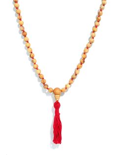 East meets West! The fragrance of Palo Santo wood from South America has now been strung into prayer beads commonly used by Hindus, Buddhists, and some Sikhs for the spiritual practice known in Sanskrit as Japa. The Guru bead is also made from Palo Santo wood. Knotting between beads for ease of moving fingers around the beads when saying prayers. This Mala is 41" in length not including the yarn tassel. 108 beads. 7/8 mm. Holistic Wooden Beads Mala For Rituals, Holistic Wooden Mala For Rituals, Spiritual Hand-strung Rosary For Meditation, Spiritual Wooden Beads Rosary For Meditation, Spiritual Rosary With Wooden Beads For Meditation, Bohemian Red Mala For Rituals, Spiritual Wooden Beads Necklace For Puja, Holistic Wooden Beads Mala For Festivals, Red Handmade Mala For Healing